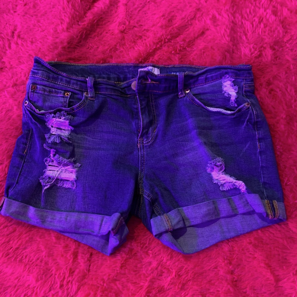 Ripped blue Jean shorts